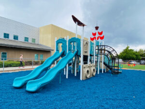 Blue Rubber Mulch with one of our custom Pirate Ship Play Structures