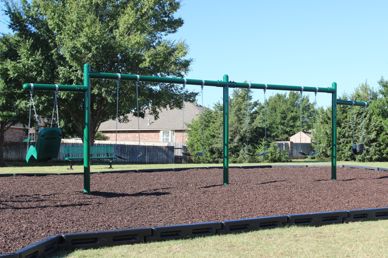Brown Rubber Mulch with 2by2 8" Border Timbers Brown Rubber Mulch with 2by2 8" Border Timbers